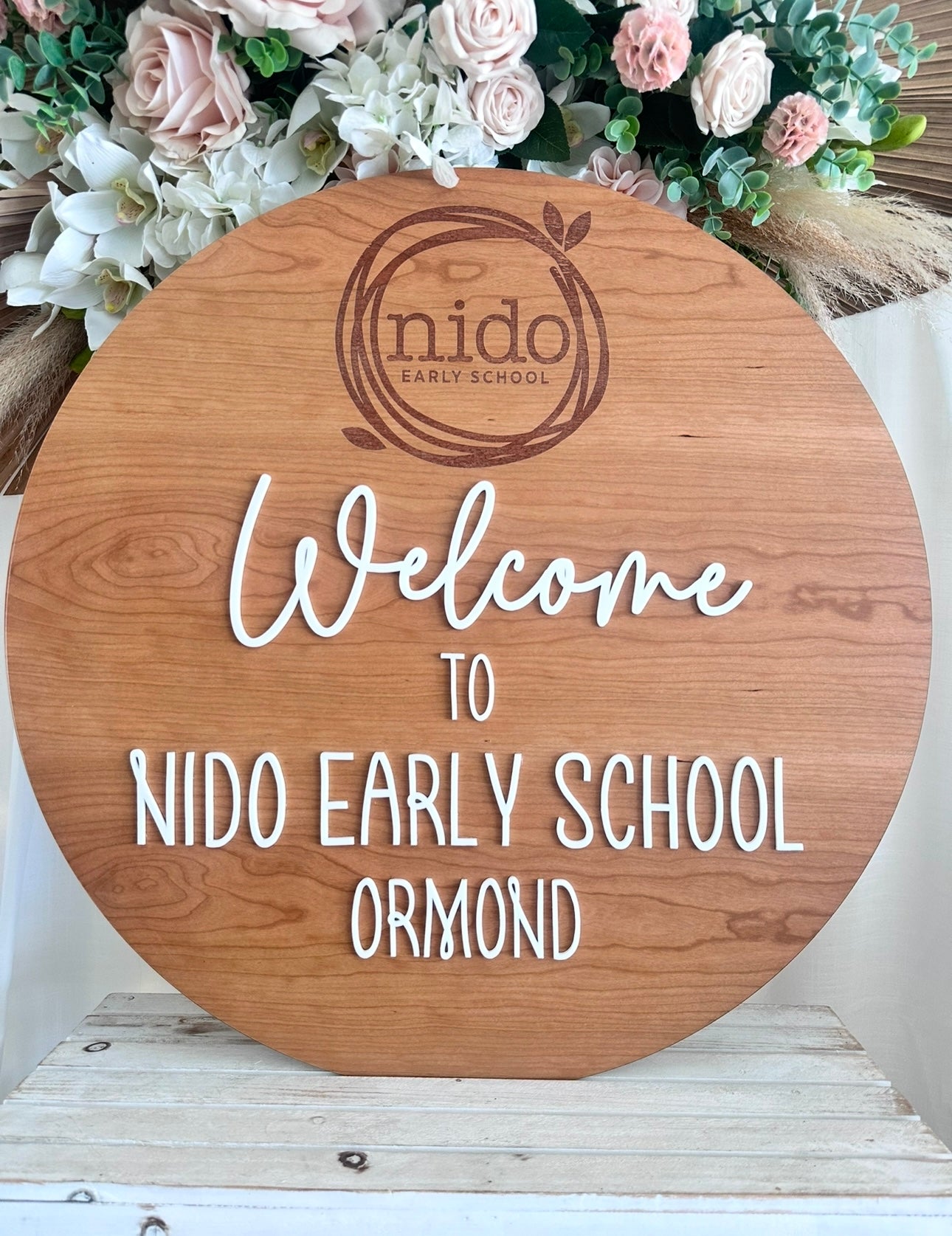 Nido round sign